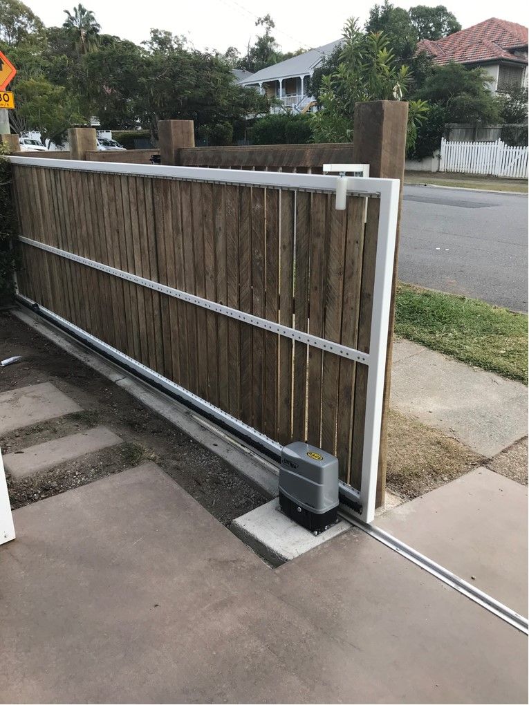 example of guide and rollers on a sliding driveway gate